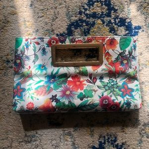 Floral faux leather clutch with detachable strap